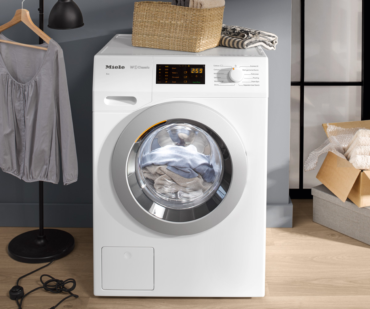 Miele W1 Classic Eco Bedienungsanleitung Tür öffnen www.miele.co.uk